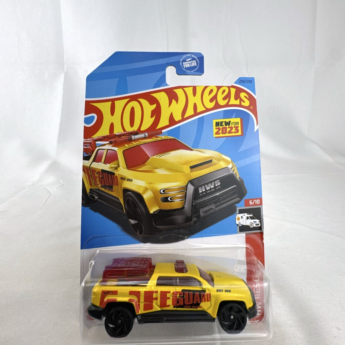 Hot Wheels 2023 Surf Duty yellow lifeguard truck diecast 1:64 scale in original sealed blister pack