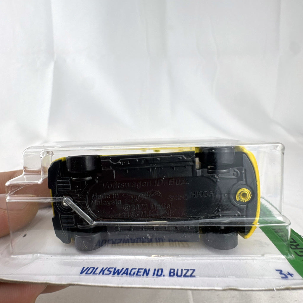 Hot Wheels 1:64 scale Volkswagen ID. Buzz diecast van in yellow and white, factory sealed on original cardback.