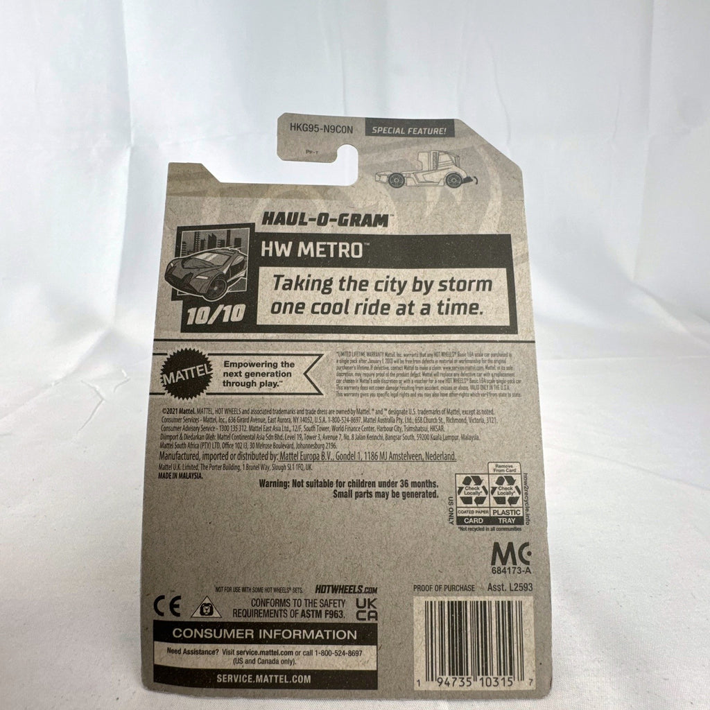 Hot Wheels Haul-O-Gram 1:64 scale translucent red diecast truck factory sealed in blister pack