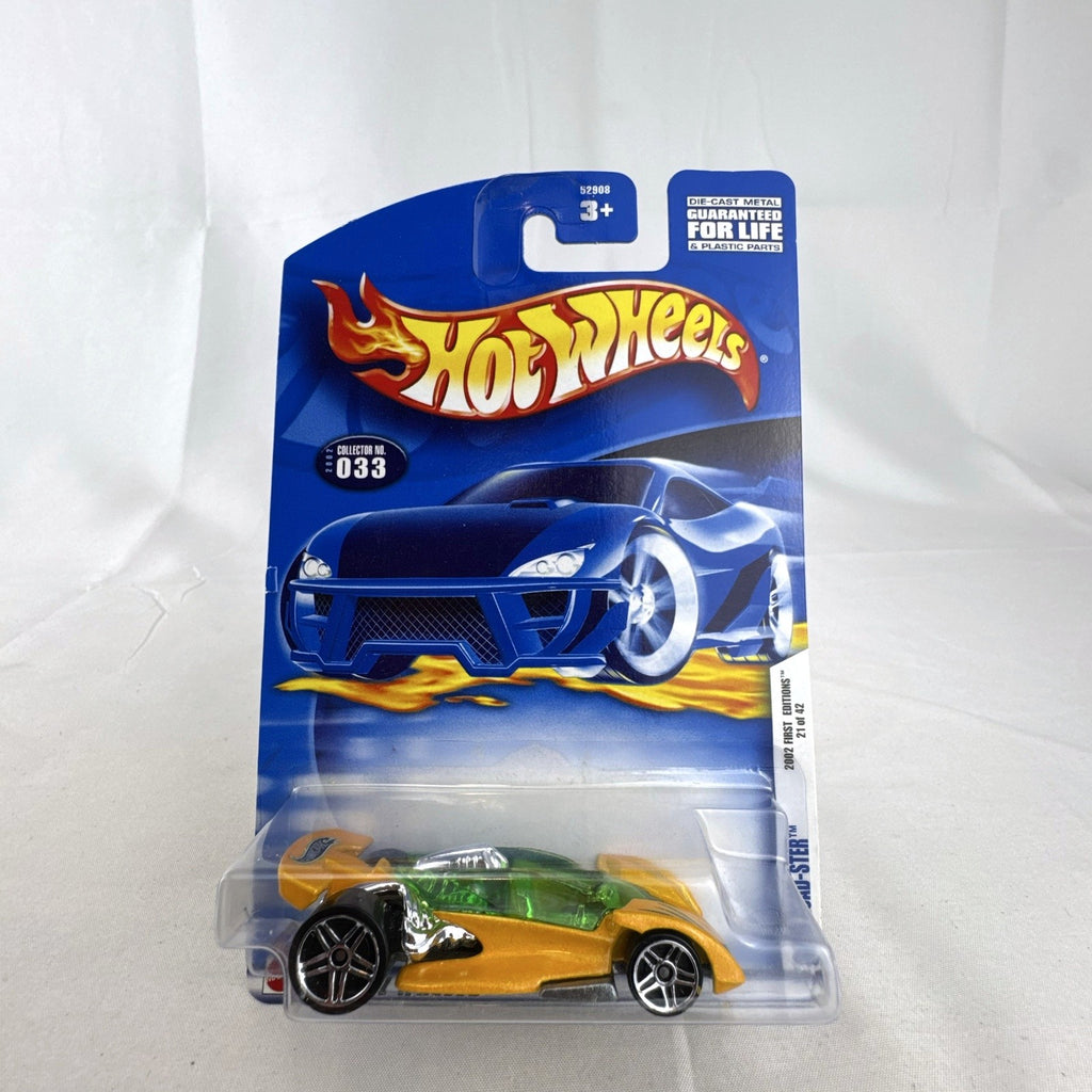 2002 Hot Wheels First Editions Open Road-Ster gold 1:64 scale diecast car sealed in original card packaging.