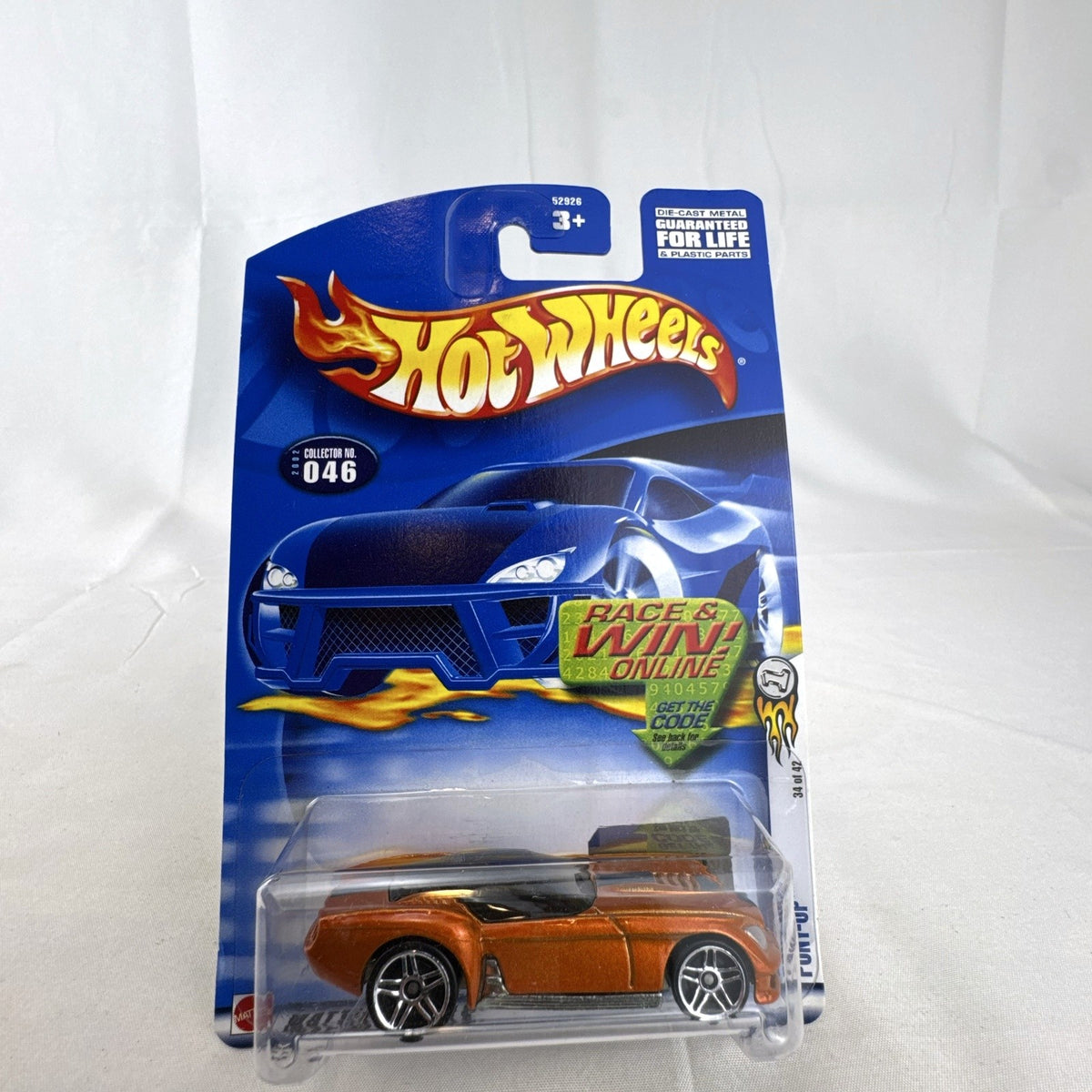 Factory sealed 2002 Hot Wheels First Editions Pony-Up diecast car in metallic orange