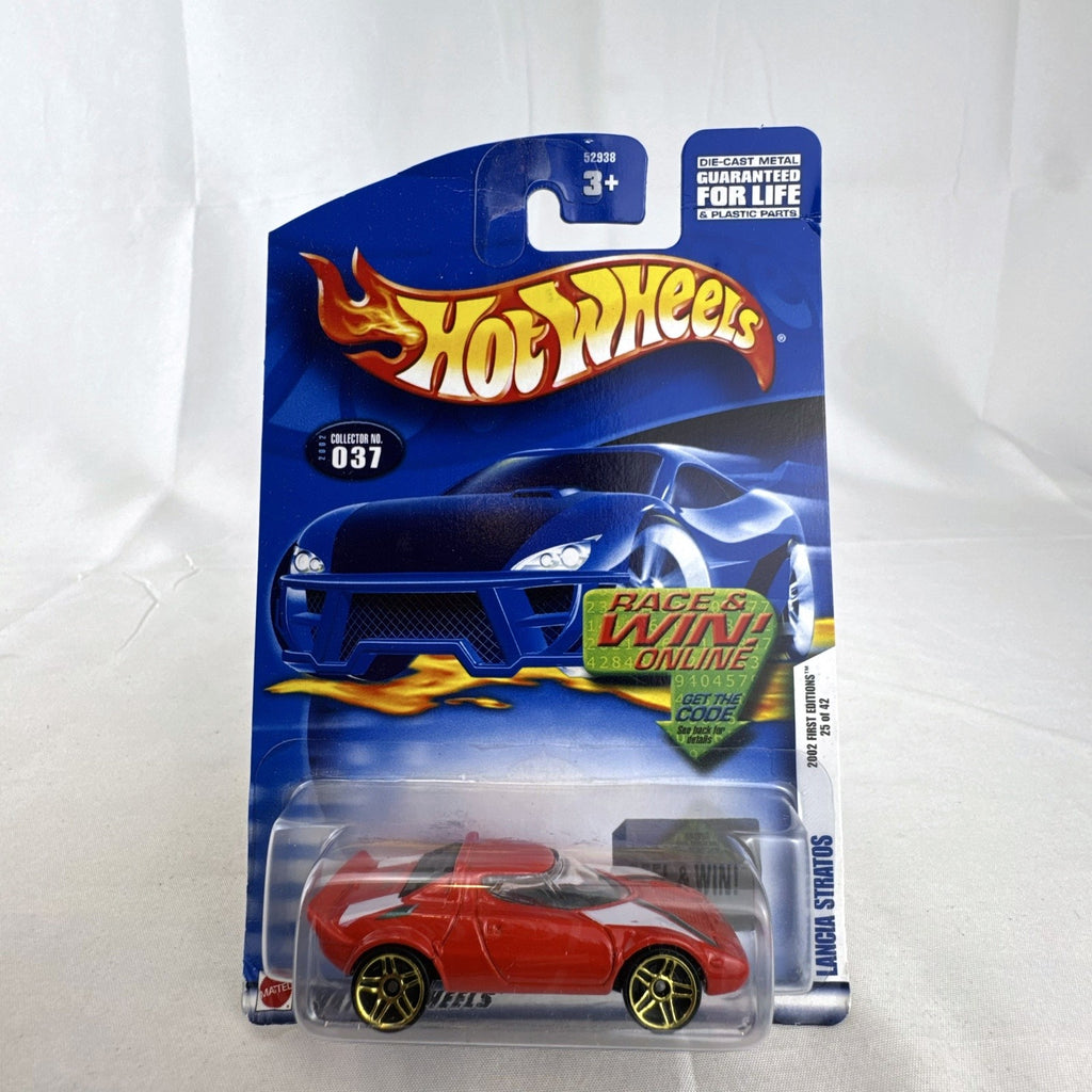 Sealed 2002 Hot Wheels First Editions red Lancia Stratos 1:64 scale diecast car on cardback with gold wheels.