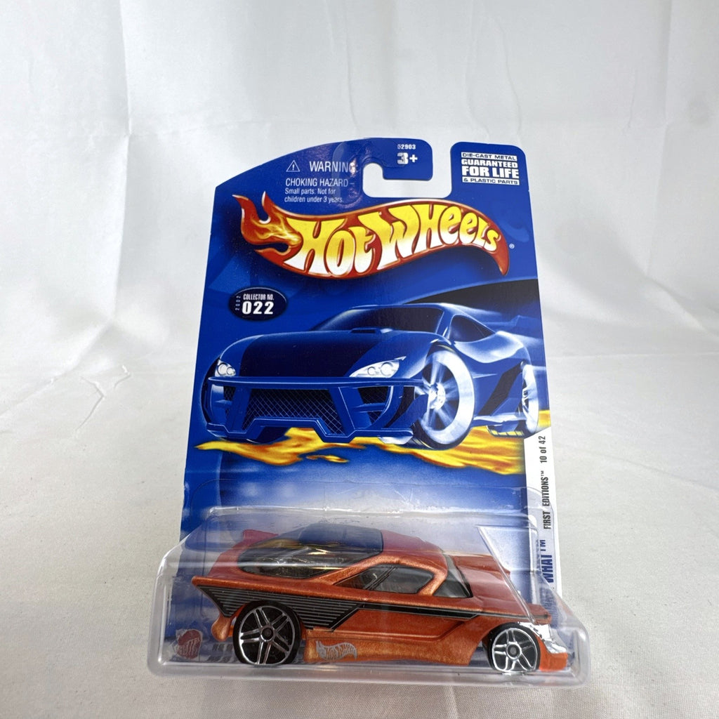 Hot Wheels 2002 First Editions Nomadder What 1:64 scale diecast car in metallic orange, sealed on original card package.