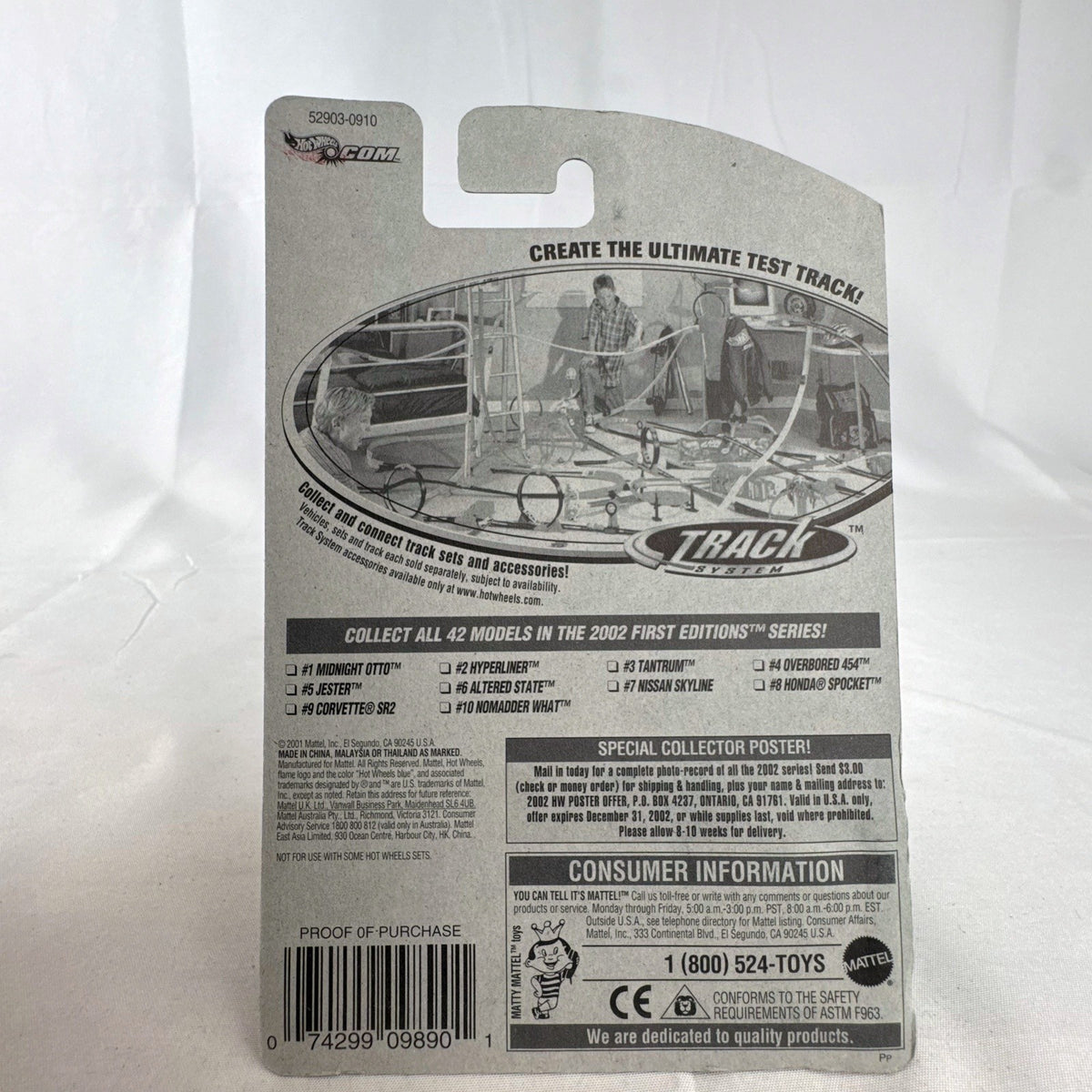 Hot Wheels 2002 First Editions Nomadder What 1:64 scale diecast car in metallic orange, sealed on original card package.
