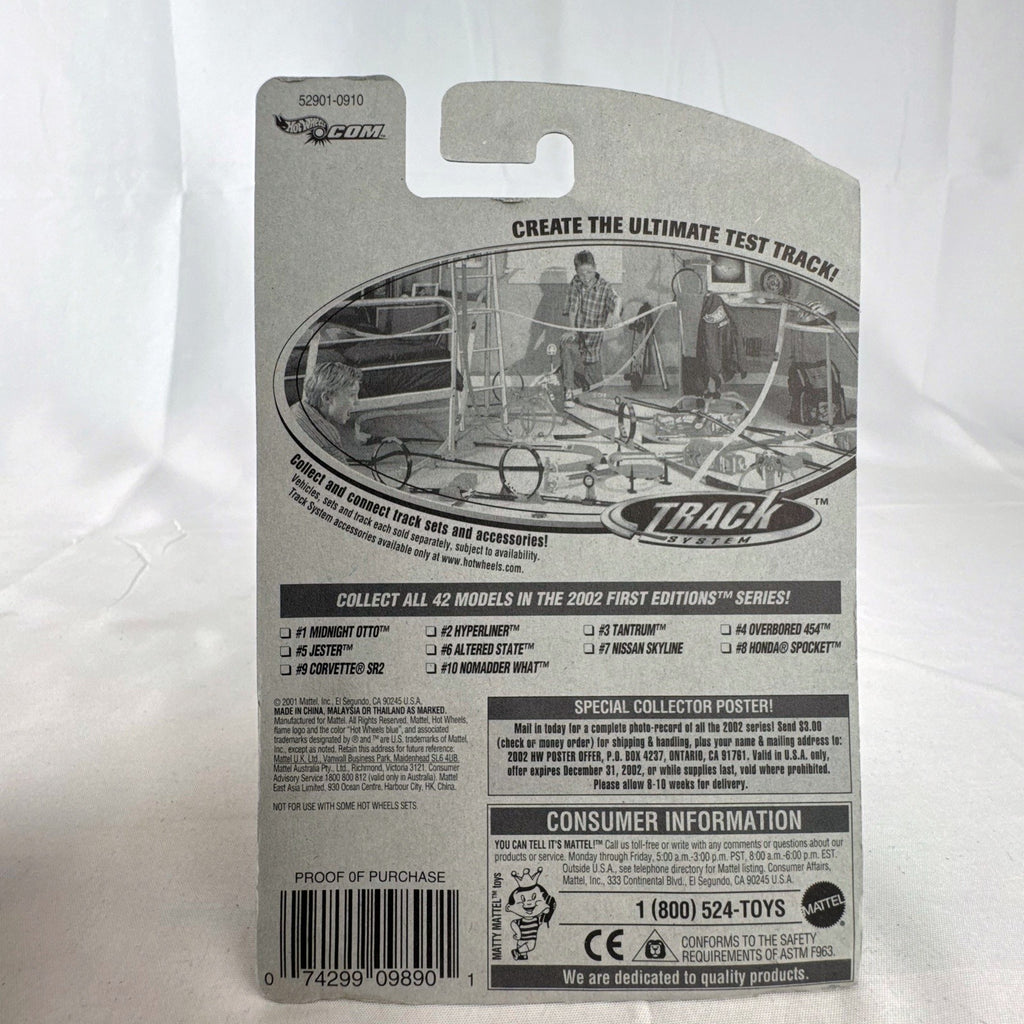 Hot Wheels 2002 Midnight Otto 1:64 scale diecast car in original packaging with pearl white, orange, and black flame graphics