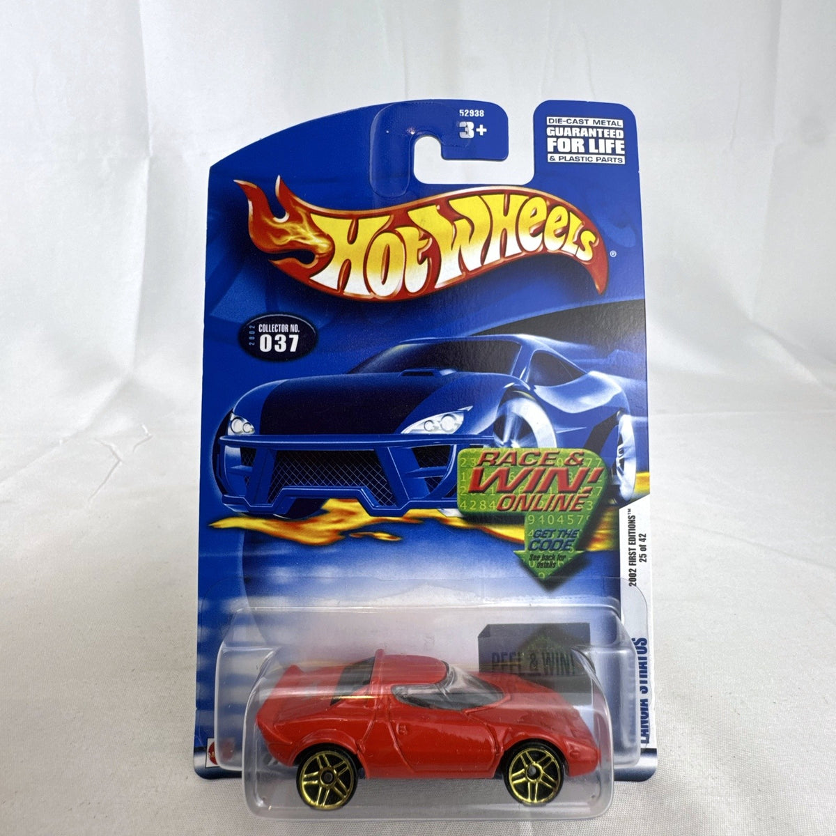 Factory sealed 2002 Hot Wheels First Editions red Lancia Stratos diecast car in 1:64 scale.