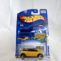 Hot Wheels 2002 First Editions 2001 Mini Cooper diecast car in yellow with white roof, sealed on card