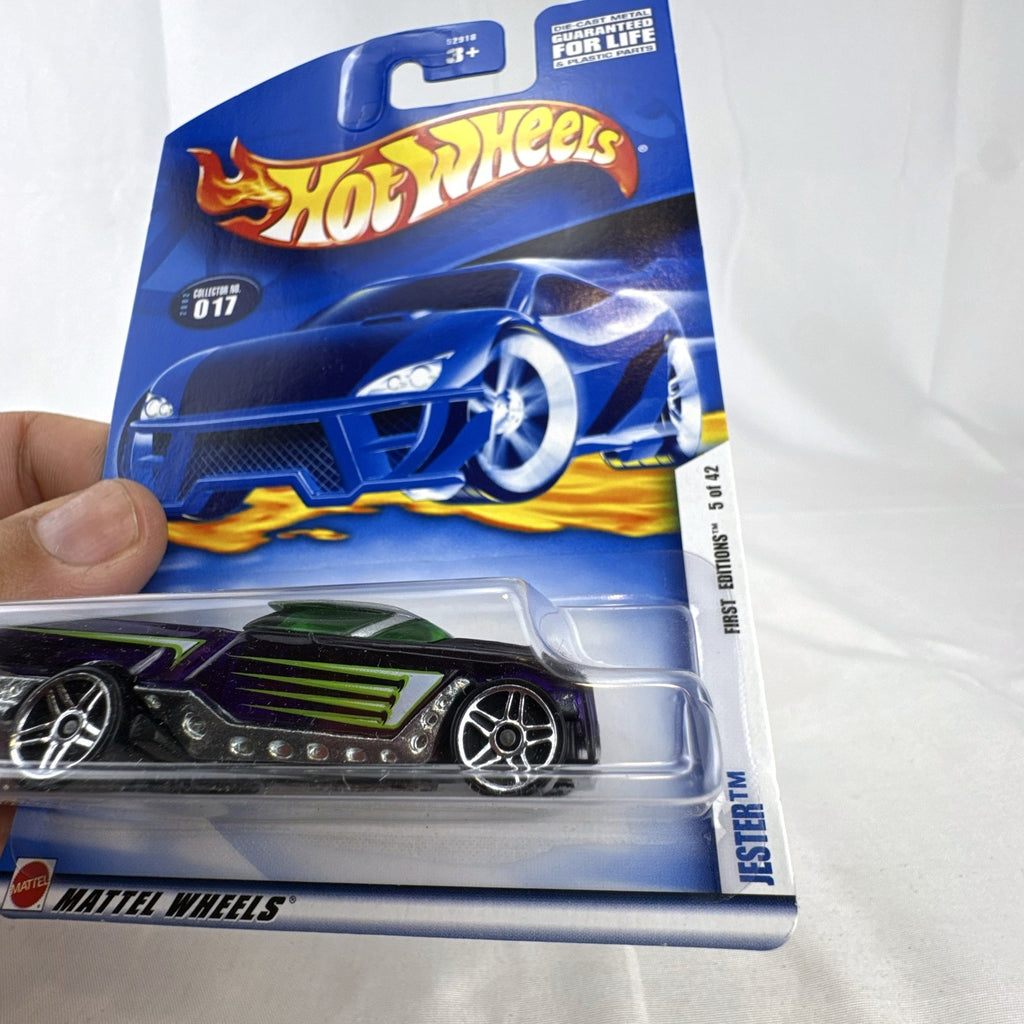 2002 Hot Wheels First Editions Jester 1:64 scale diecast car sealed on card in deep purple and black.