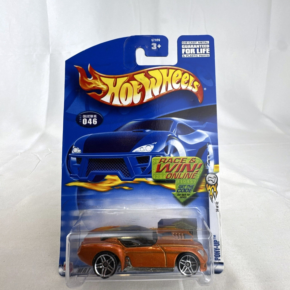 Sealed 2002 Hot Wheels First Editions Pony-Up 1:64 diecast car in metallic orange on original packaging card