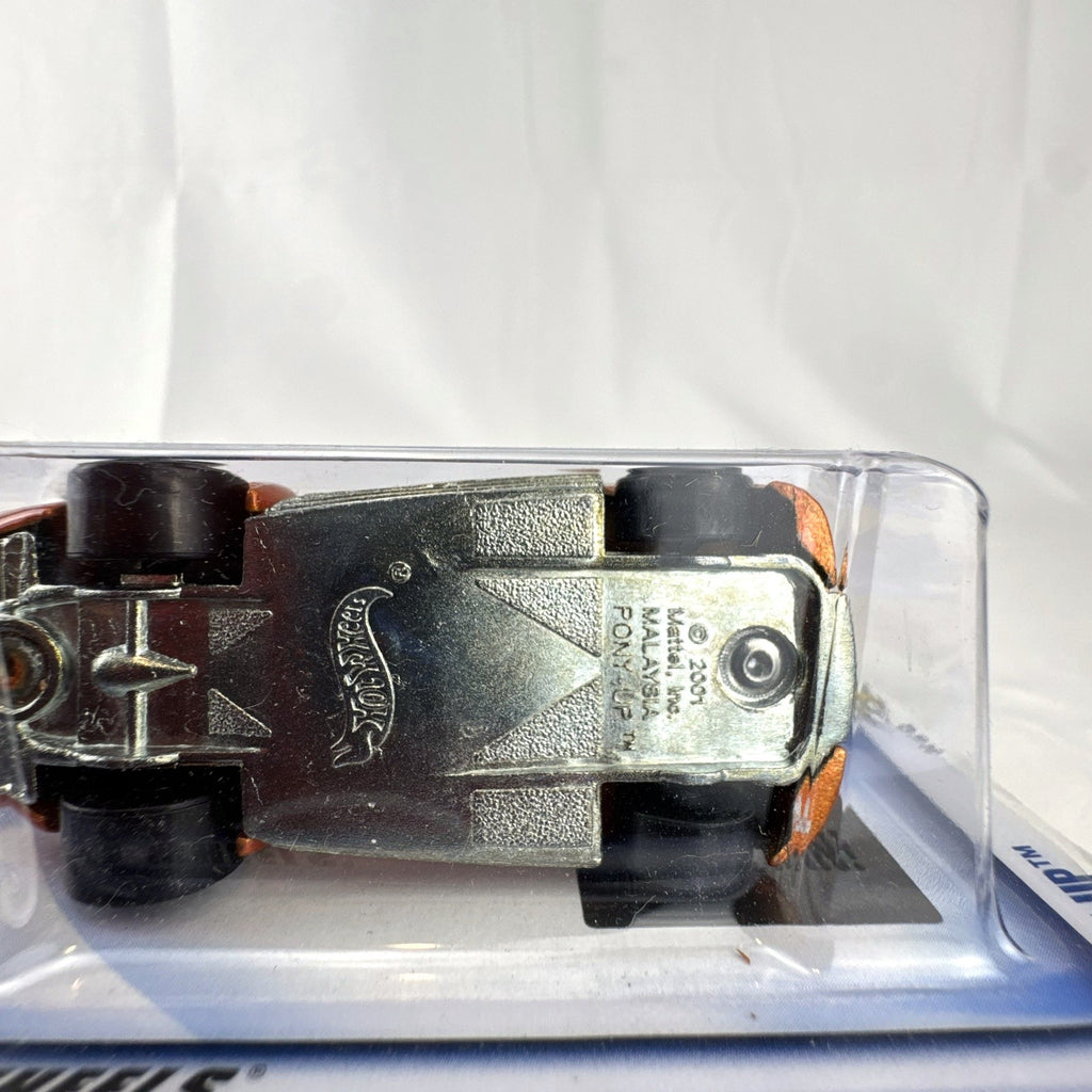 Sealed 2002 Hot Wheels First Editions Pony-Up 1:64 diecast car in metallic orange on original packaging card