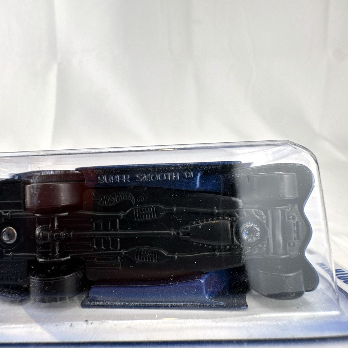 Hot Wheels 2002 First Editions Super Smooth custom blue pickup truck in original sealed packaging.