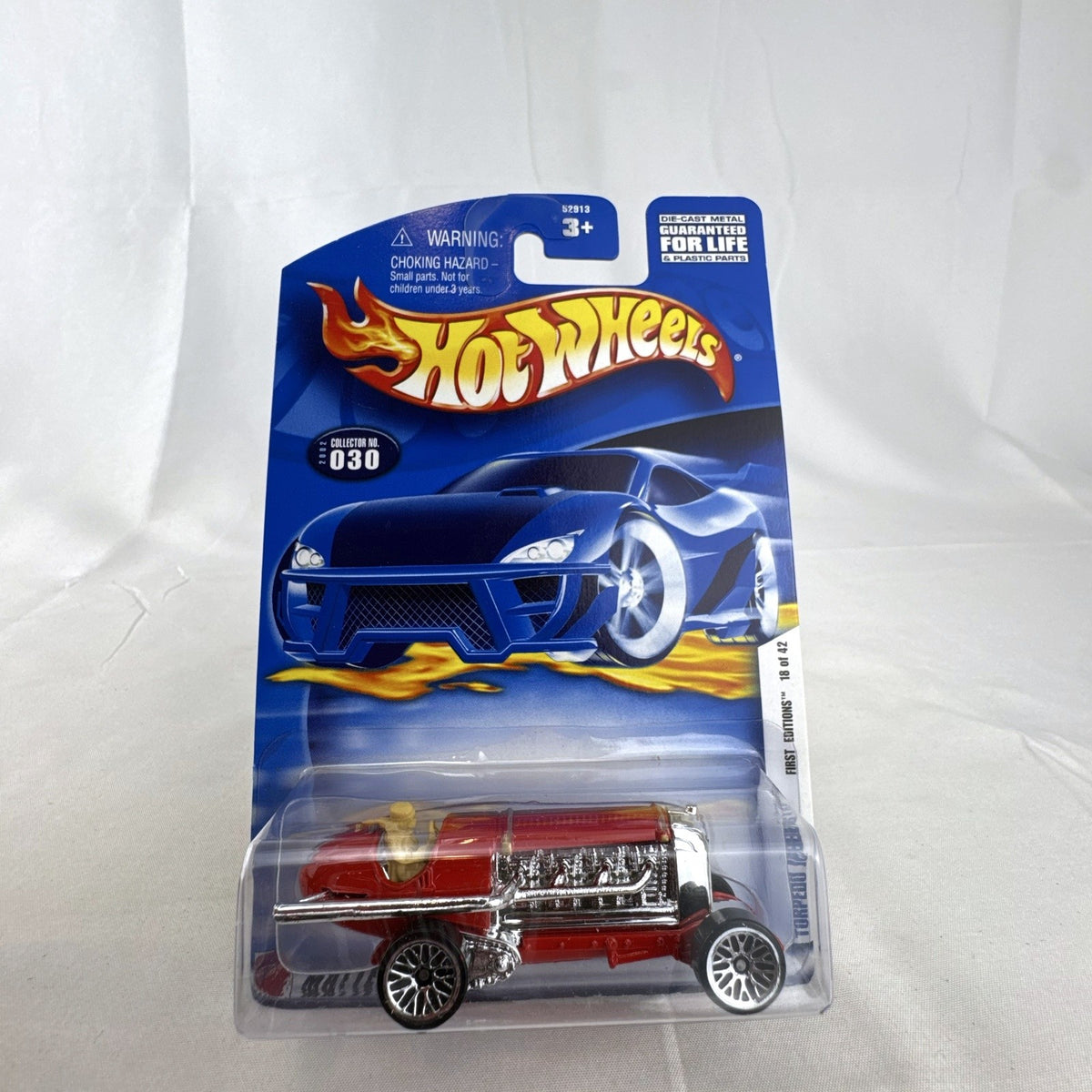 2002 Hot Wheels First Editions Torpedo Jones 1:64 scale gloss red diecast car in original packaging