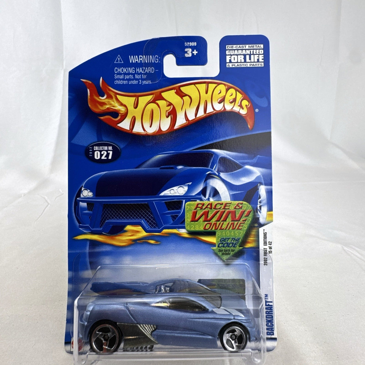 Hot Wheels 2002 First Editions Backdraft 1:64 diecast car in metallic blue, factory sealed on original card packaging.