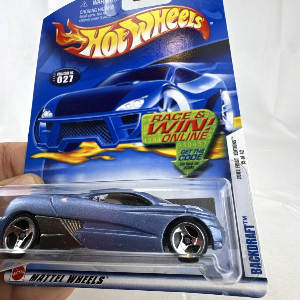 Hot Wheels 2002 First Editions Backdraft 1:64 diecast car in metallic blue, factory sealed on original card packaging.