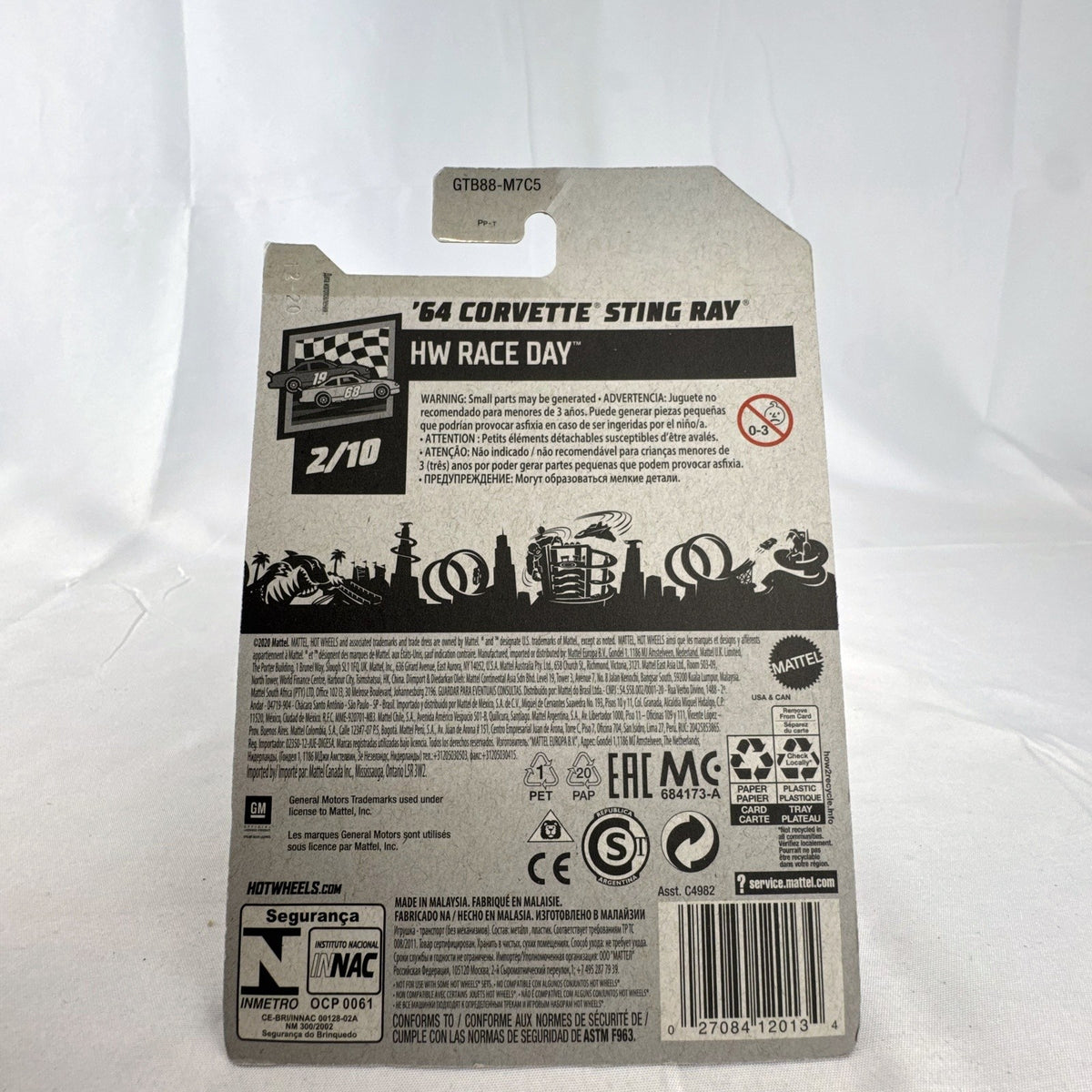 Hot Wheels 1:64 1964 Chevrolet Corvette Sting Ray in white from the HW Race Day series, factory sealed on blister card.