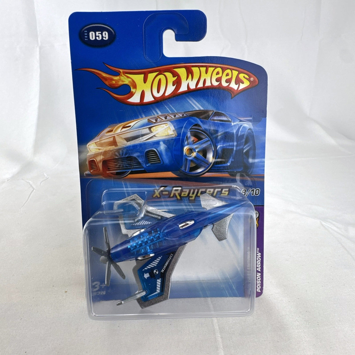 Hot Wheels 2005 First Editions X-Raycers Poison Arrow 1:64 scale translucent blue diecast plane in original package