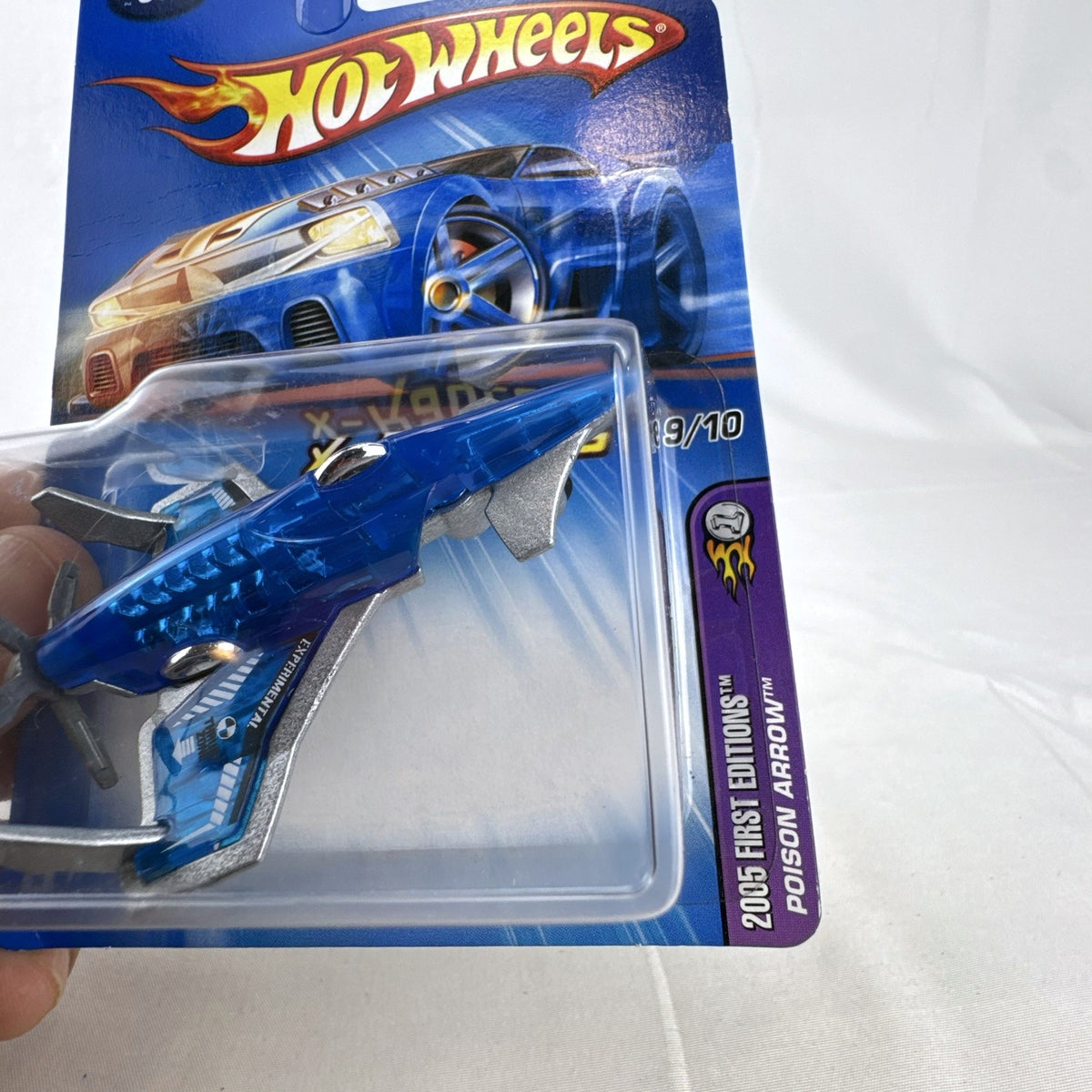 Hot Wheels 2005 First Editions X-Raycers Poison Arrow 1:64 scale translucent blue diecast plane in original package