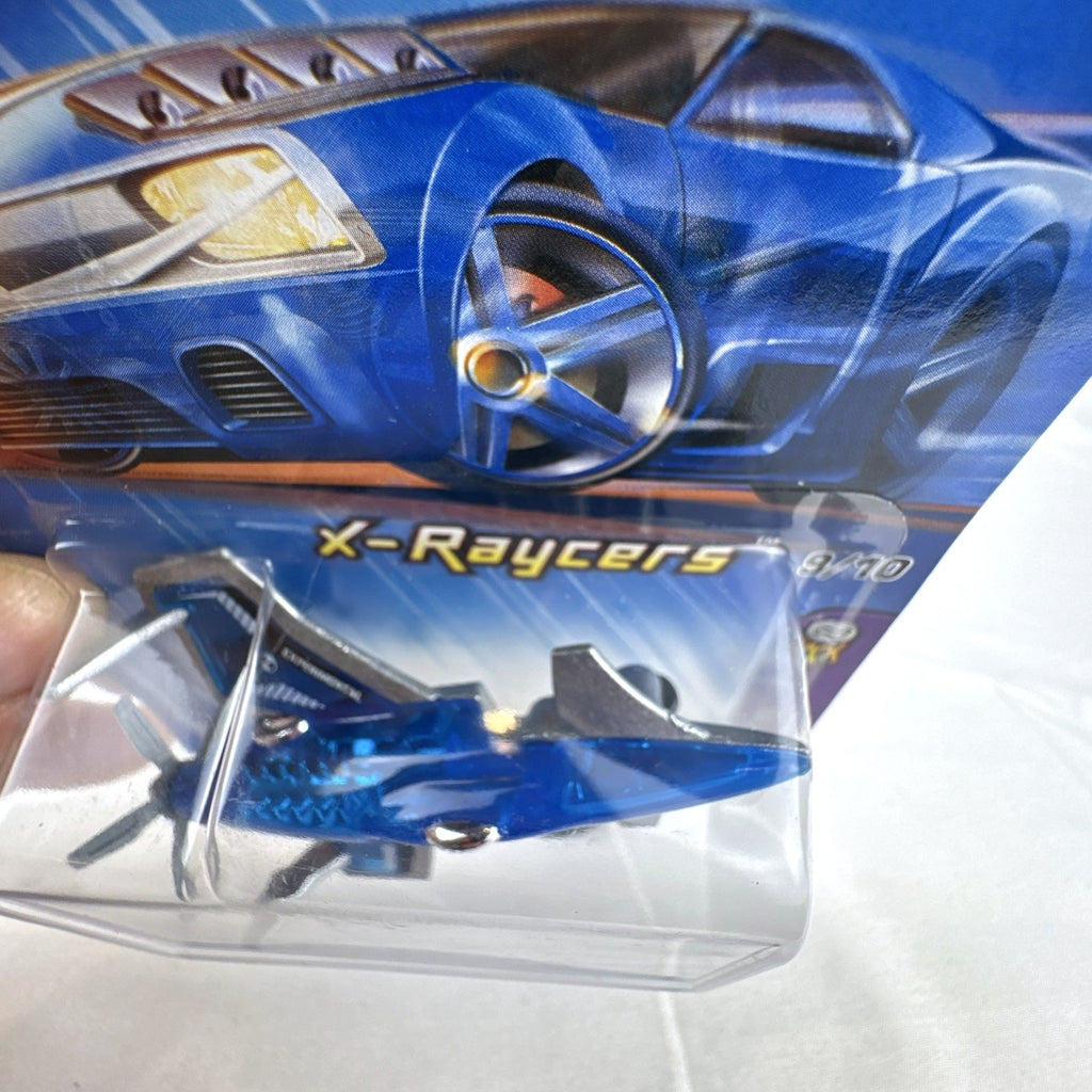 Hot Wheels 2005 First Editions X-Raycers Poison Arrow 1:64 scale translucent blue diecast plane in original package