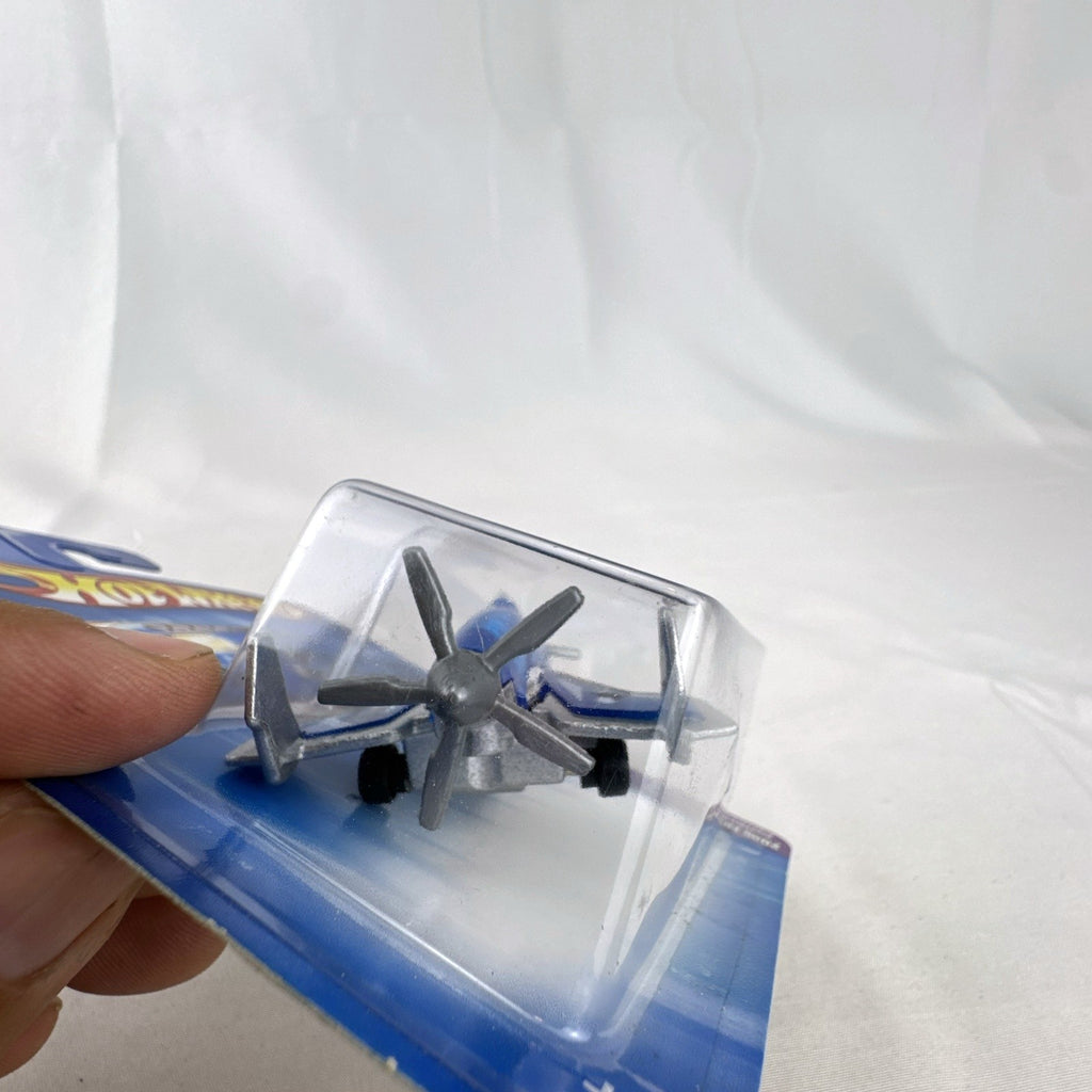 Hot Wheels 2005 First Editions X-Raycers Poison Arrow 1:64 scale translucent blue diecast plane in original package