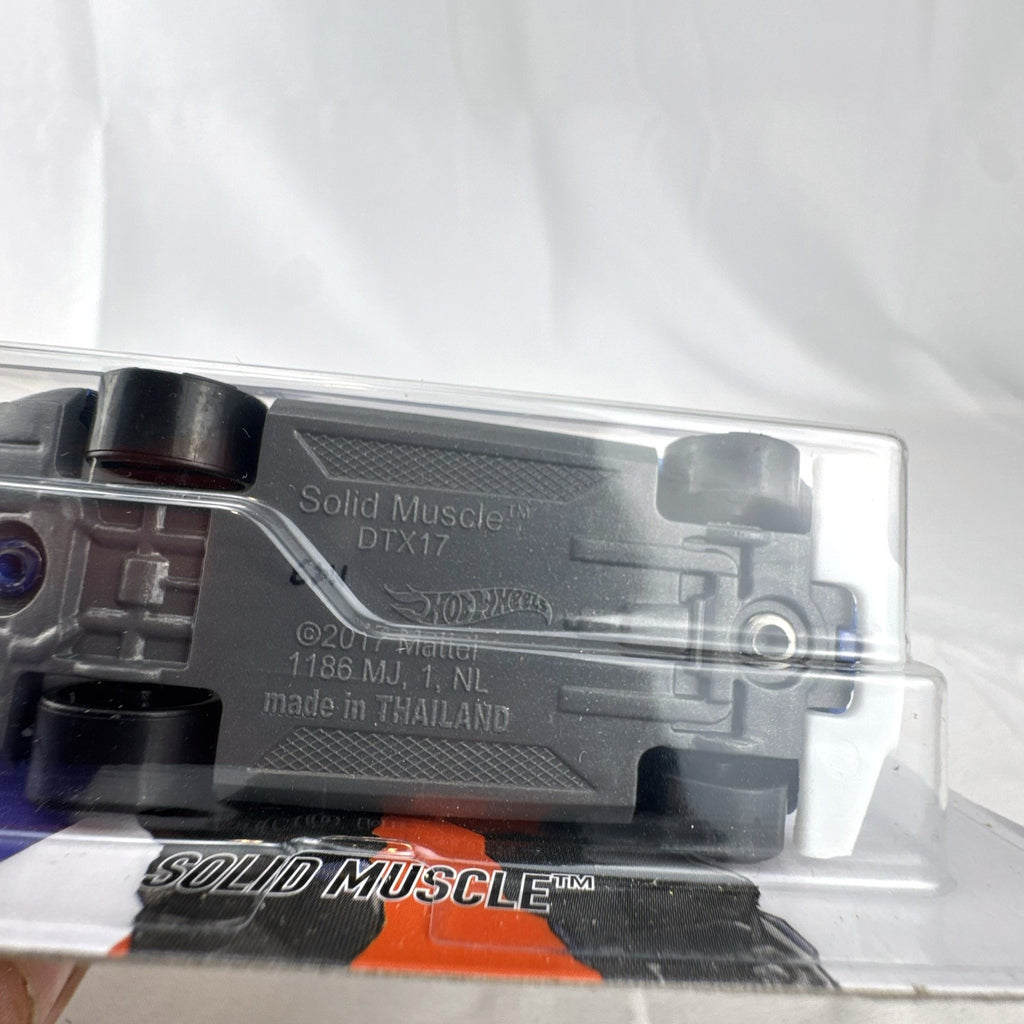 Hot Wheels 1:64 scale Solid Muscle diecast car featuring Blizzard Overwatch hero Soldier: 76 artwork in factory sealed card.