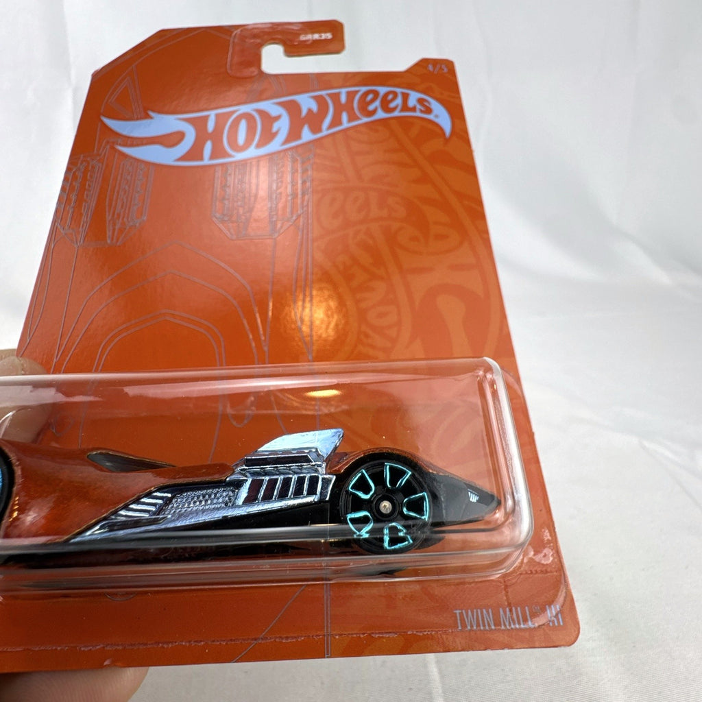 Hot Wheels Twin Mill III 1:64 scale diecast car in satin metallic orange 53rd Anniversary packaging.