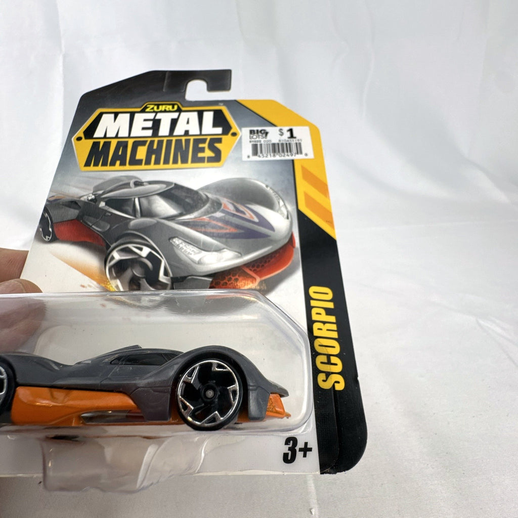 Zuru Metal Machines Scorpio 1:64 scale diecast car in factory sealed packaging, featuring dark gray and orange styling.