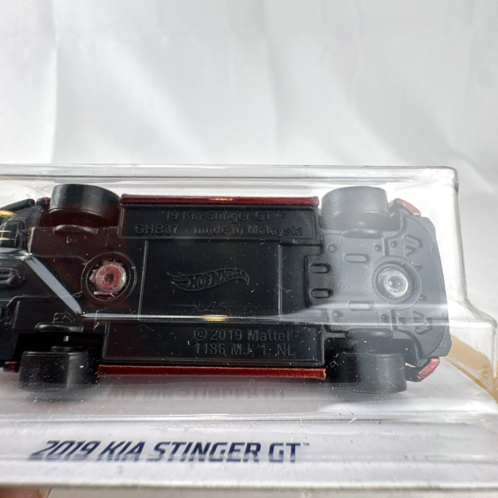 Hot Wheels 1:64 scale 2019 Kia Stinger GT diecast car in metallic red on original unopened card