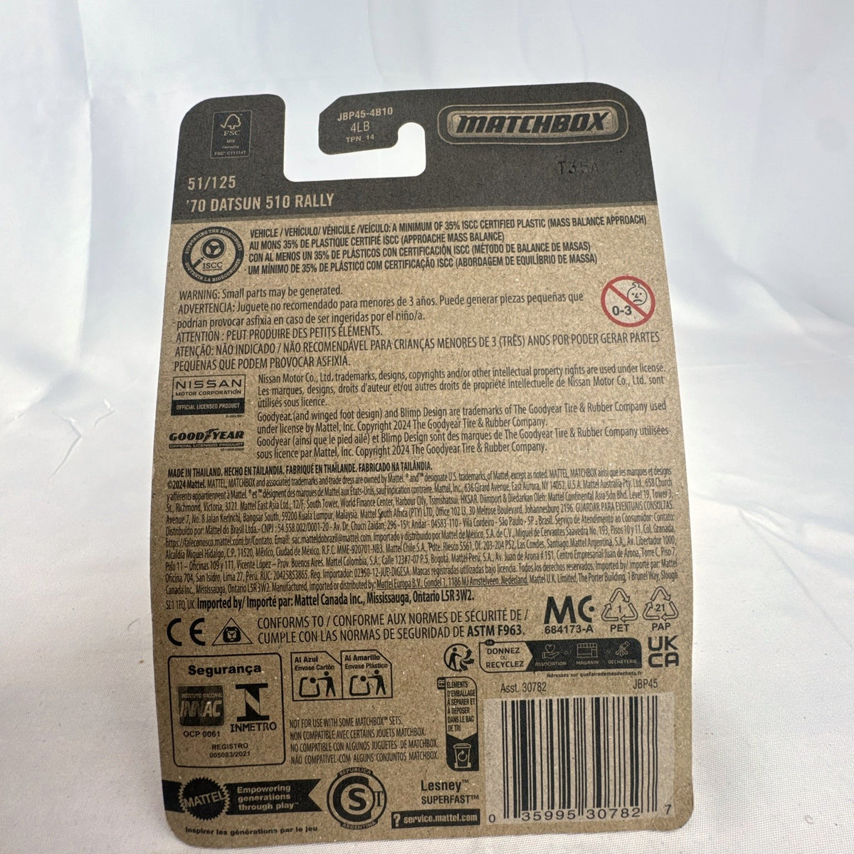 Factory sealed Matchbox 1970 Datsun 510 Rally 1:64 scale diecast car in light blue on original card packaging.