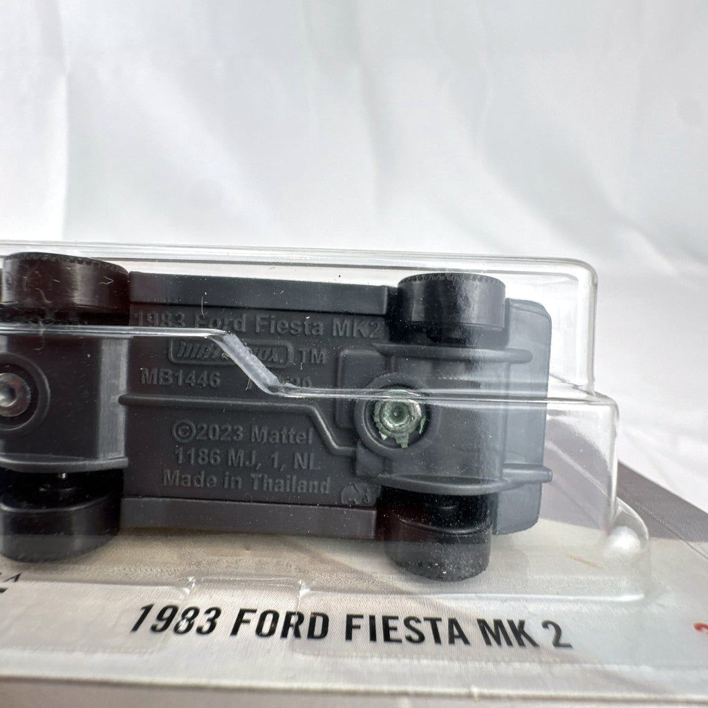 Matchbox 1:64 scale 1983 Ford Fiesta MK 2 diecast car in metallic green factory sealed on card.