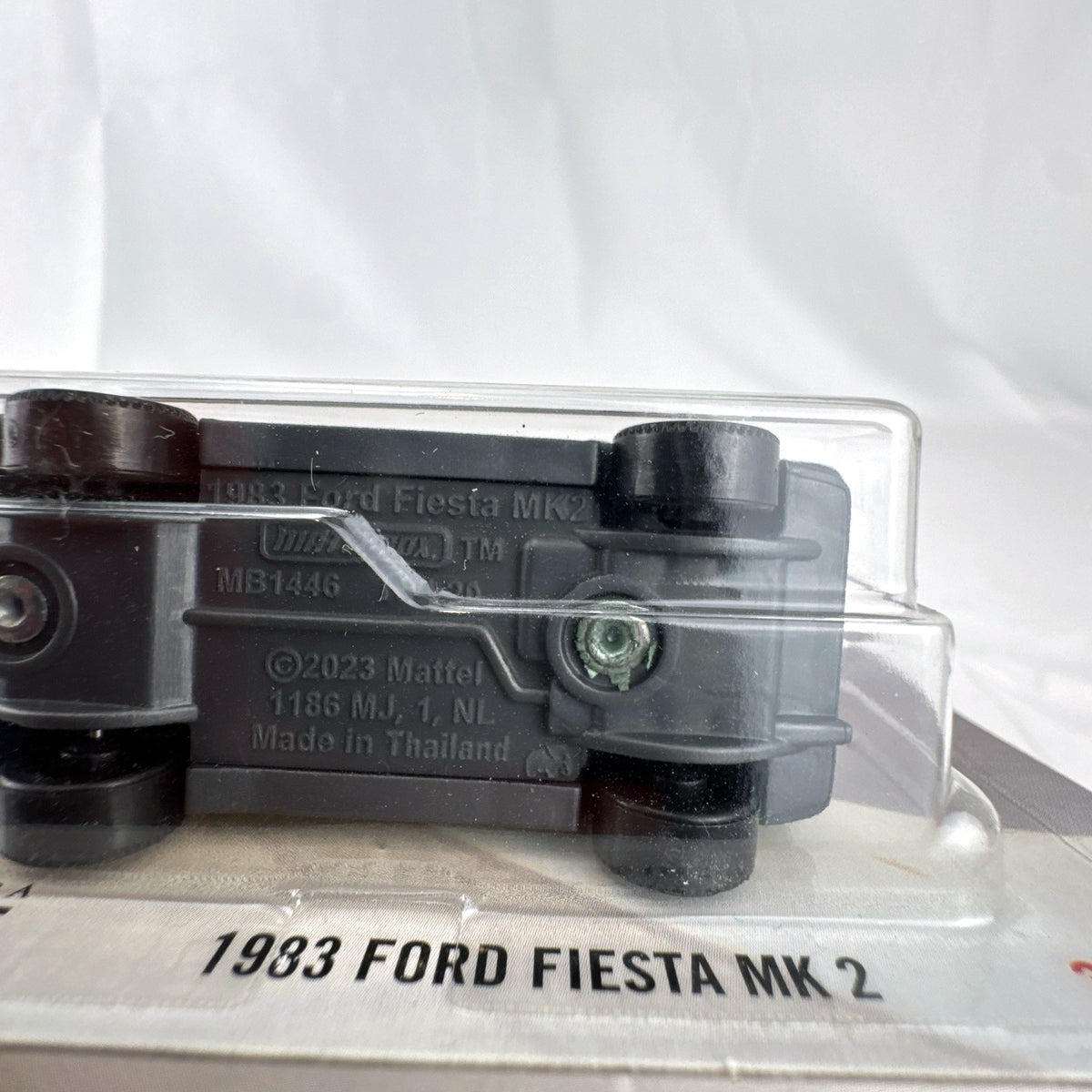Matchbox 1:64 scale 1983 Ford Fiesta MK 2 diecast car in metallic green factory sealed on card.