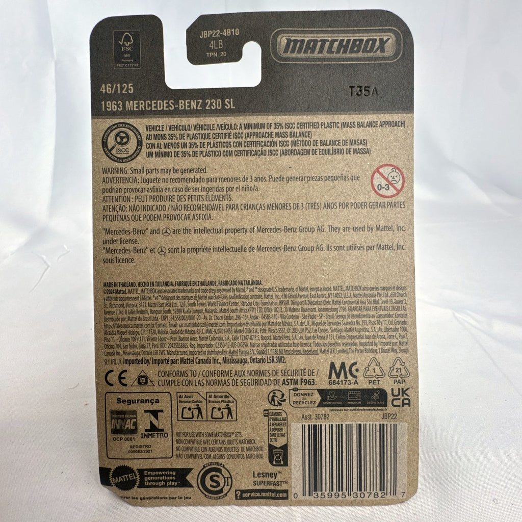 Matchbox 1:64 scale 1963 Mercedes-Benz 230 SL diecast model car in metallic gold on original unopened blister card.