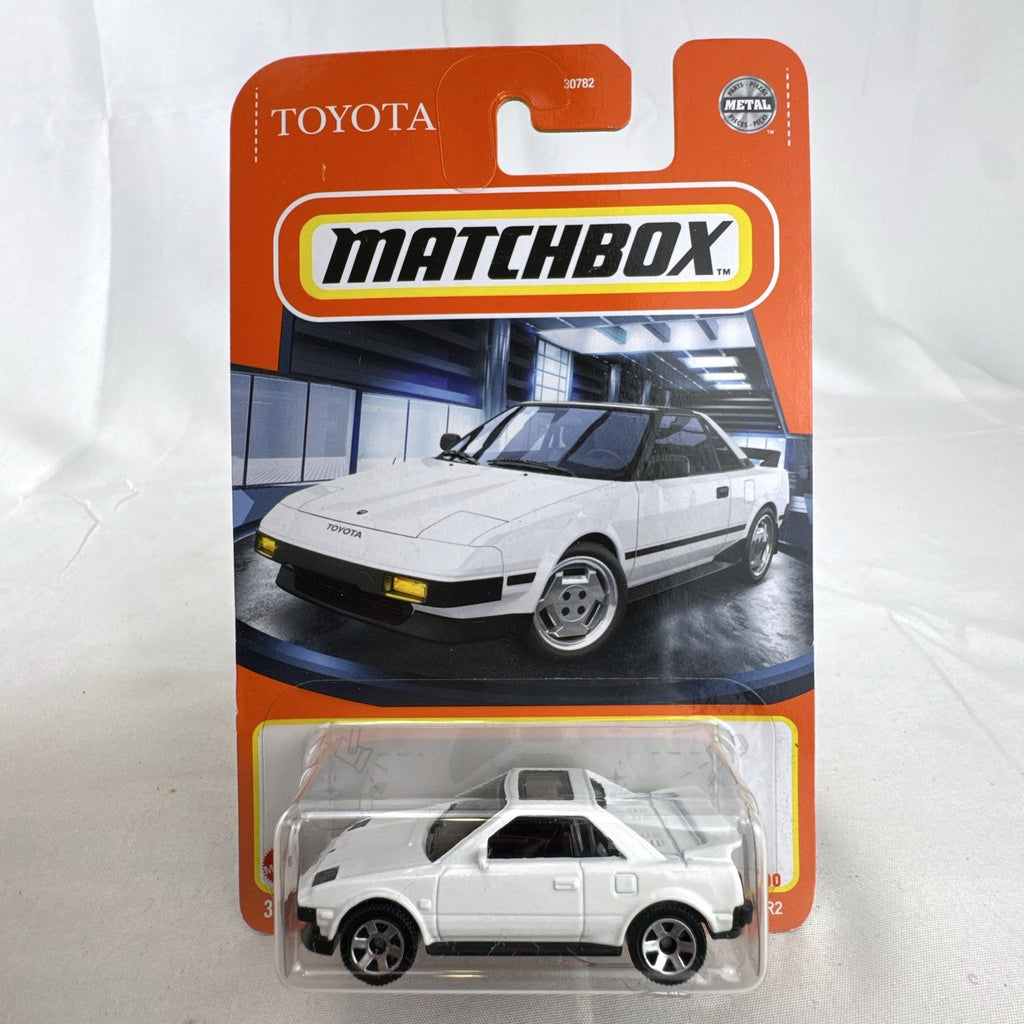 Matchbox 1984 Toyota MR2 1:64 scale white diecast car in original blister card packaging.