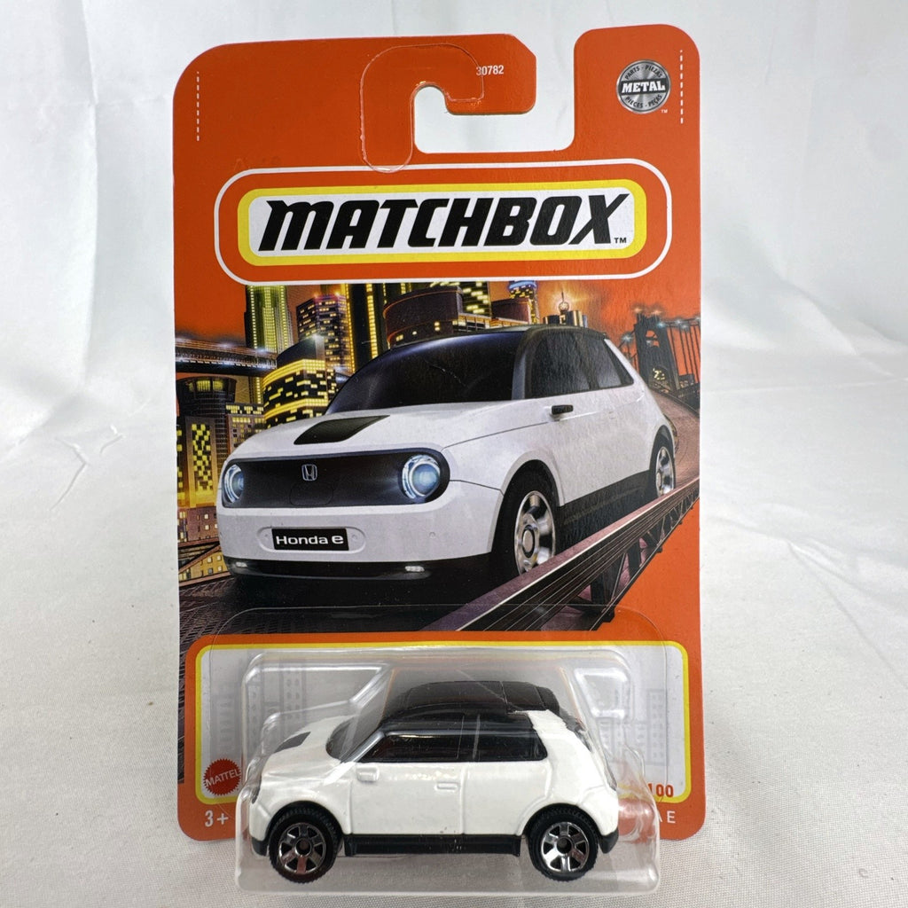 Matchbox 1:64 scale 2020 Honda e diecast hatchback in gloss white, factory sealed on original blister card.