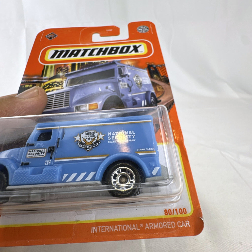 Matchbox 1:81 International Armored Car diecast in light blue National Security livery sealed on card