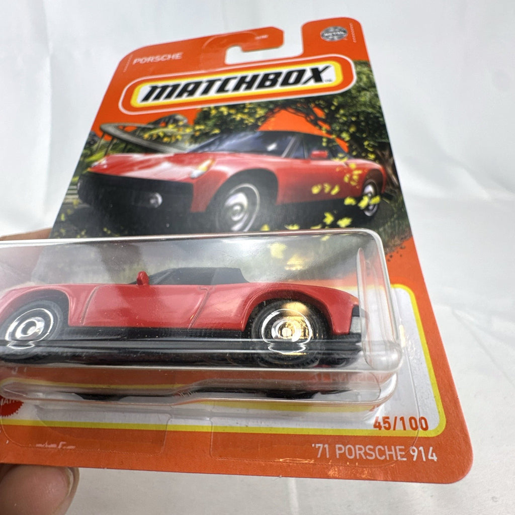 Matchbox 1:64 scale 1971 Porsche 914 diecast car in red with black targa top, sealed on original blister card.