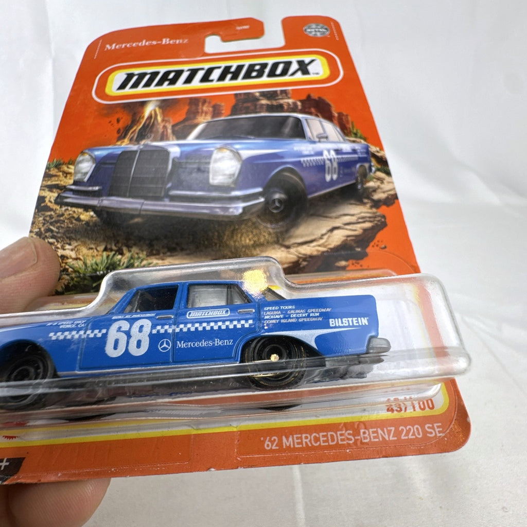 Matchbox 1:64 diecast 1962 Mercedes-Benz 220 SE rally car in blue on original sealed card packaging