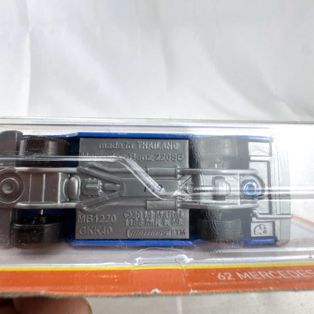 Matchbox 1:64 diecast 1962 Mercedes-Benz 220 SE rally car in blue on original sealed card packaging
