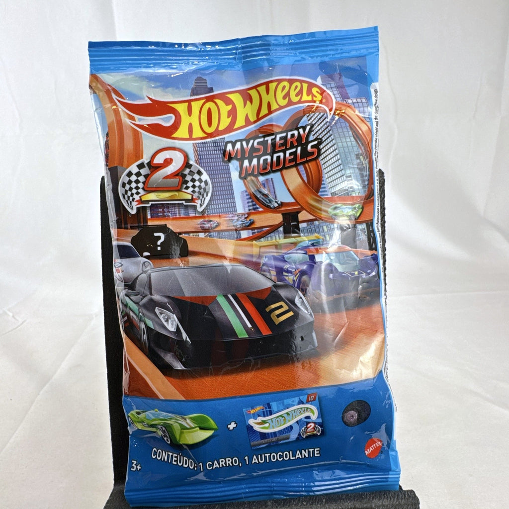 Factory sealed Hot Wheels Mystery Models Series 2 foil bag containing a 1:64 scale surprise diecast vehicle.