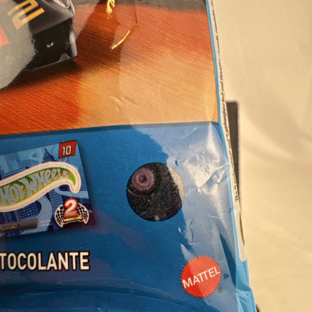 Factory sealed Hot Wheels Mystery Models Series 2 foil bag containing a 1:64 scale surprise diecast vehicle.