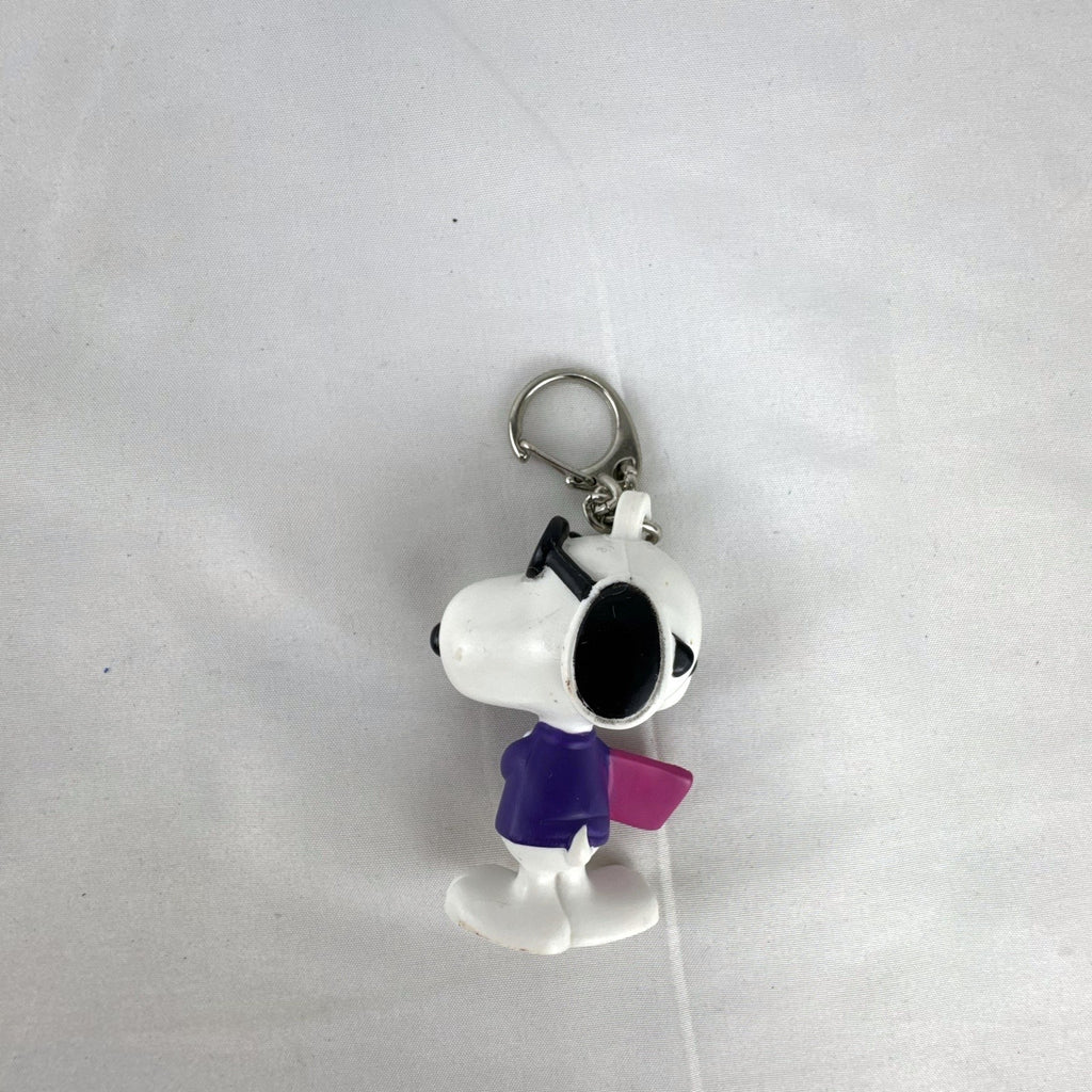 Peanuts Snoopy Joe Cool plastic keychain figure with purple sweater, flip-up sunglasses, and Valentine envelope clip.