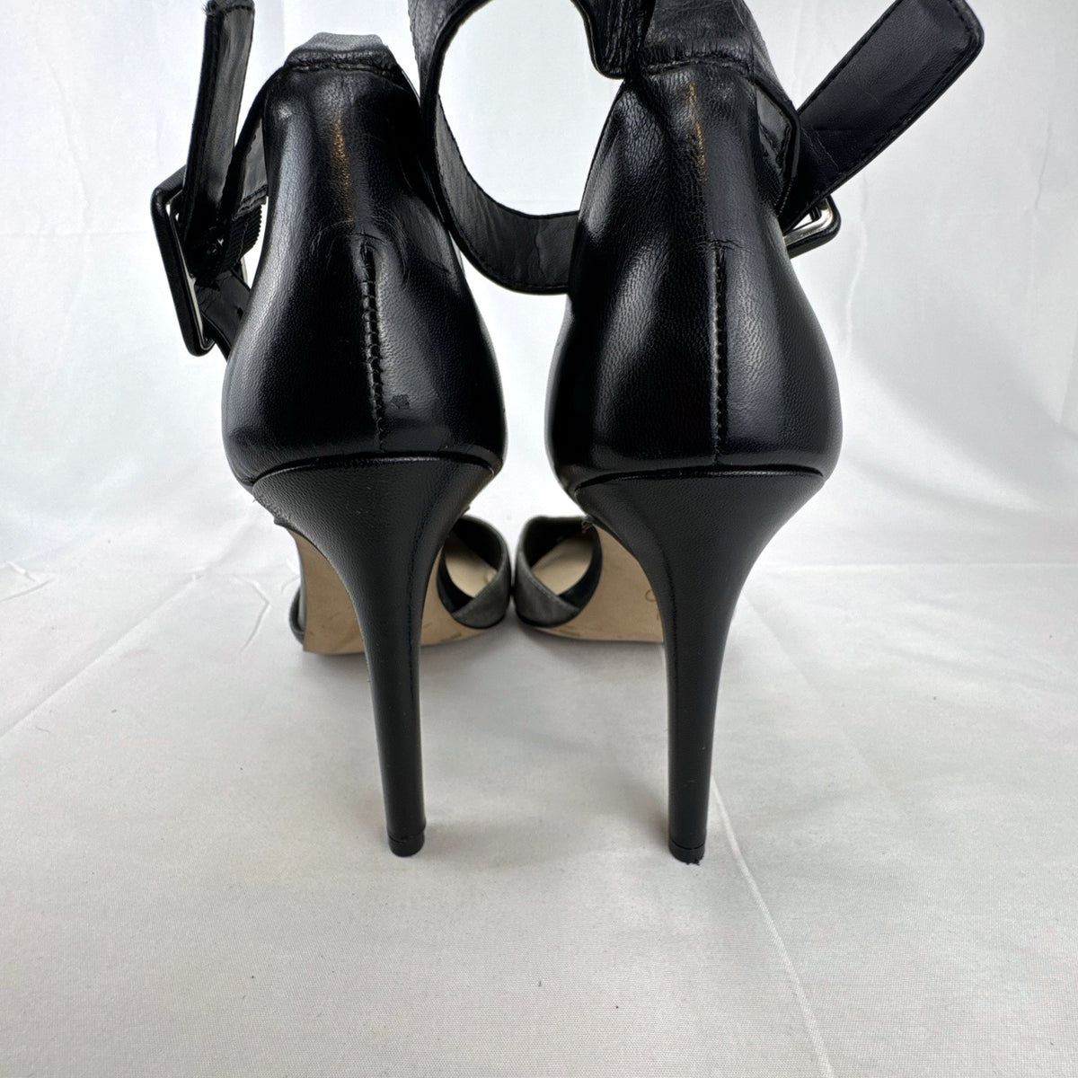 Jessica Simpson gray snake print d'Orsay pumps with black ankle straps, size 8.