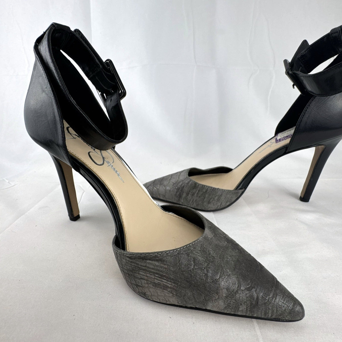 Jessica Simpson gray snake print d'Orsay pumps with black ankle straps, size 8.
