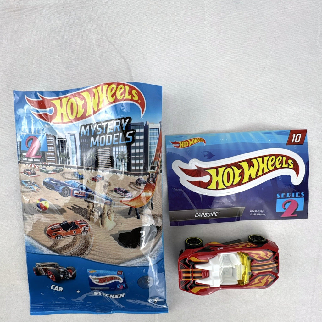 Red Hot Wheels Carbonic 1:64 scale diecast car from Mystery Models Series 2 with yellow graphics and opened foil pouch.
