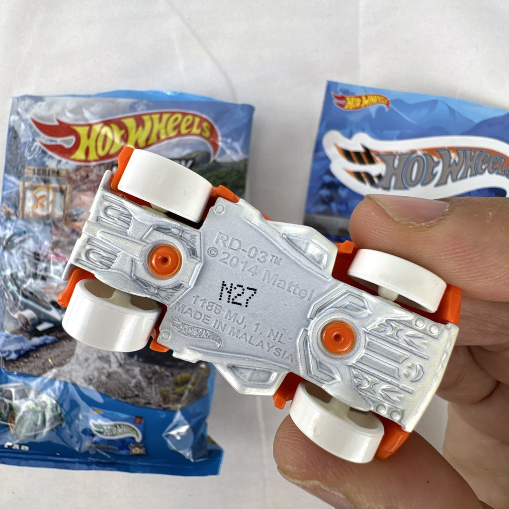 Hot Wheels 1:64 scale RD-03 diecast car in bright orange from Mystery Models Series 3 with original sticker