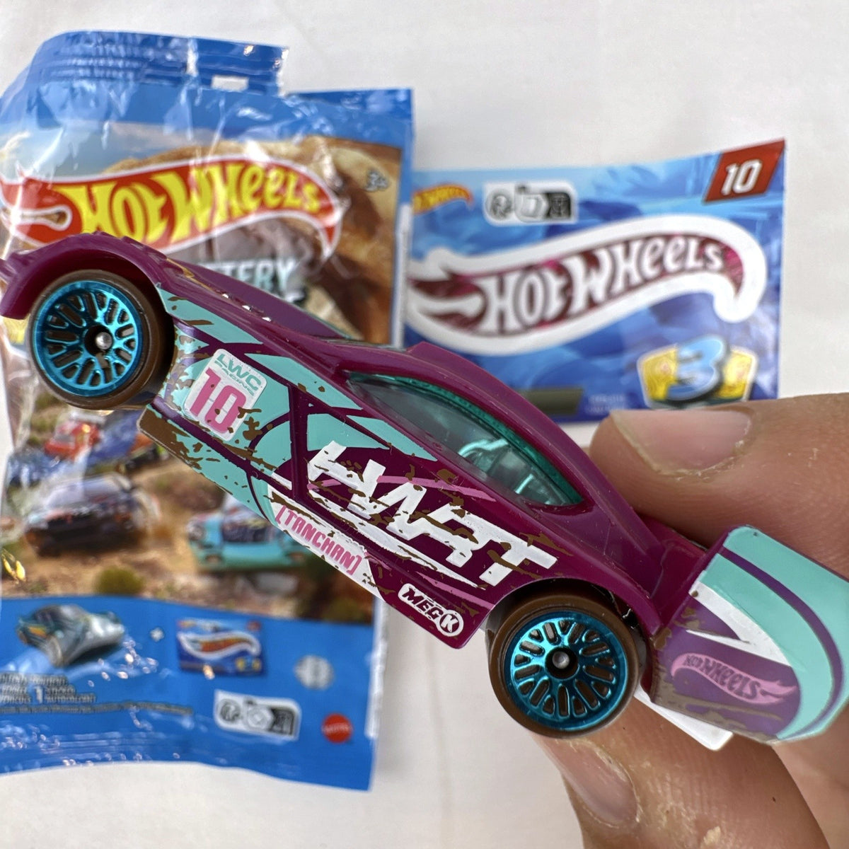 Hot Wheels Time Tracker 1:64 scale purple diecast car from 2022 Mystery Models Series 3