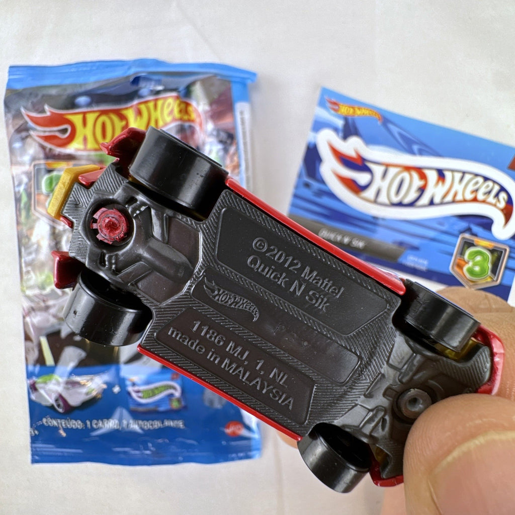 Hot Wheels 1:64 Quick N' Sik diecast car in red with A-51 Security livery from Mystery Models Series 3