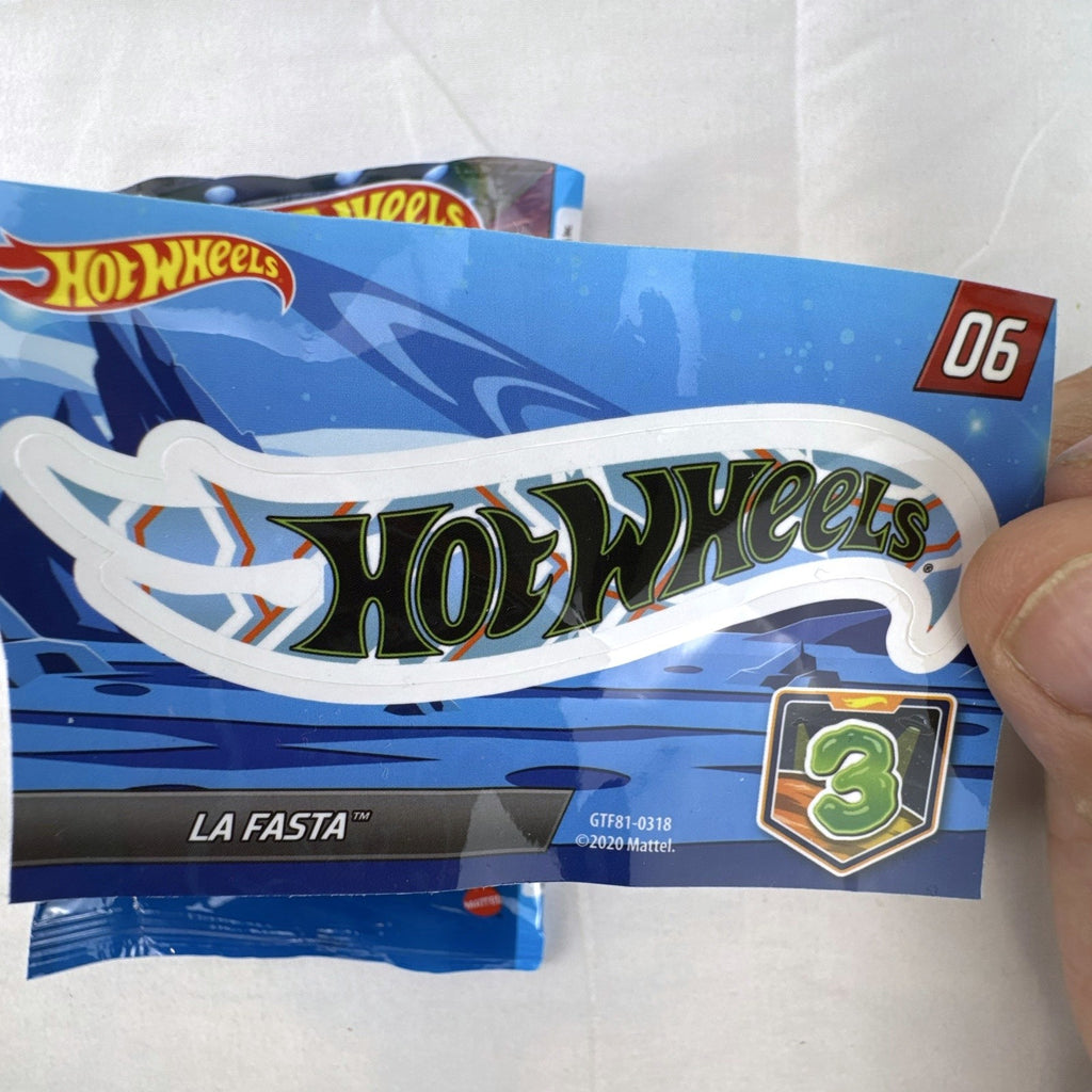 Hot Wheels La Fasta 1:64 diecast car in blue with A-51 Investigator graphics from Mystery Models Series 3 with sticker sheet