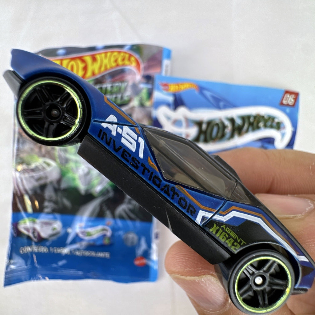 Hot Wheels La Fasta 1:64 diecast car in blue with A-51 Investigator graphics from Mystery Models Series 3 with sticker sheet
