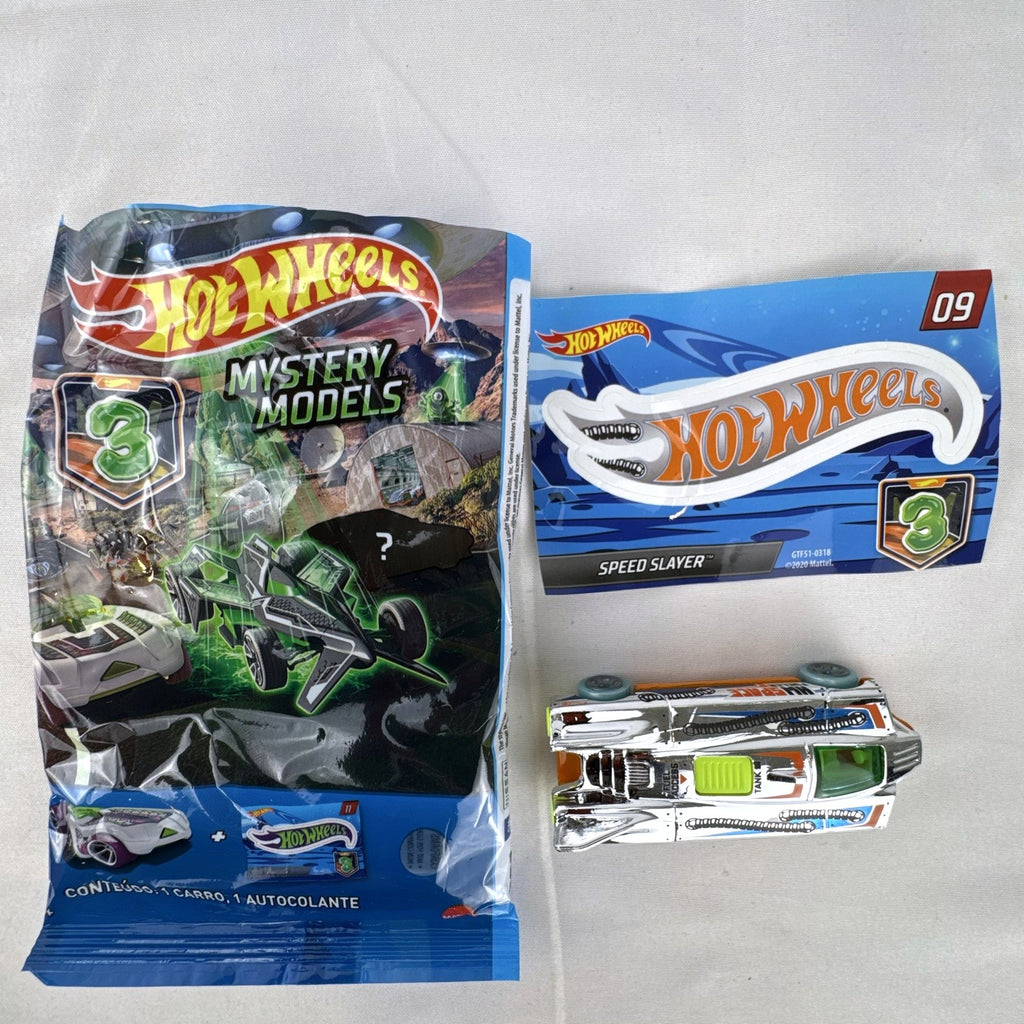 Hot Wheels Speed Slayer 1:64 scale diecast car in chrome with orange base, lime green canopy, foil bag, and sticker.