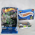 Hot Wheels Speed Slayer 1:64 scale diecast car in chrome with orange base, lime green canopy, foil bag, and sticker.